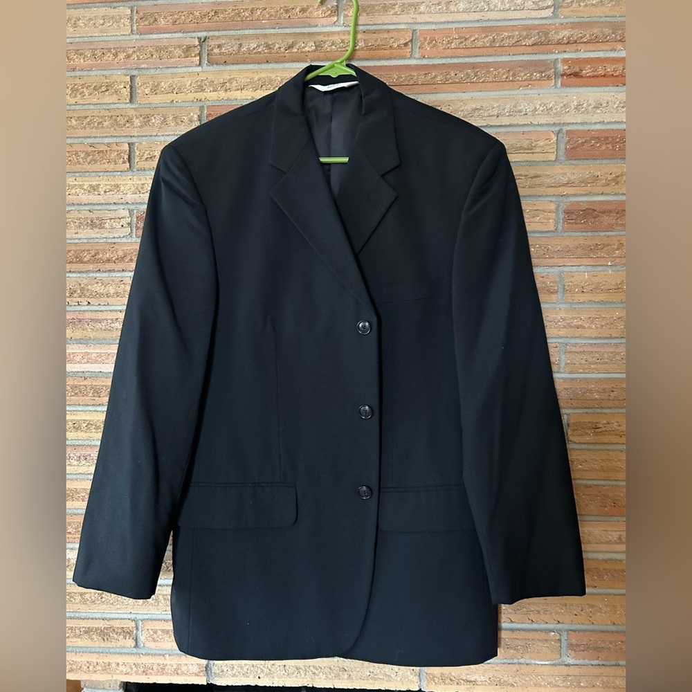 Men’s black sports coat by Versini.